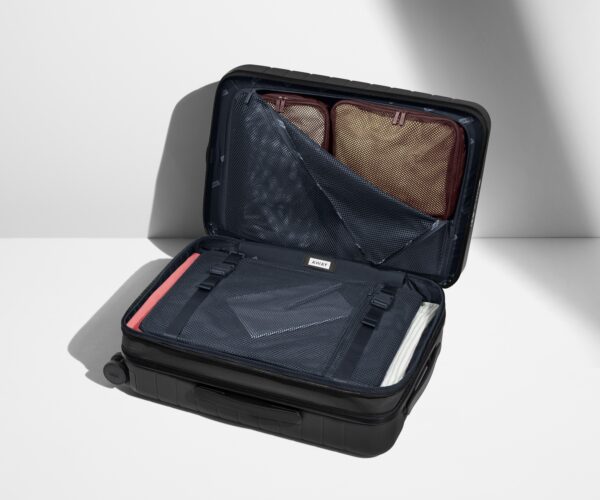 The Bigger Carry-On Flex in Navy Blue