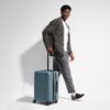 The Bigger Carry-On Flex in Navy Blue
