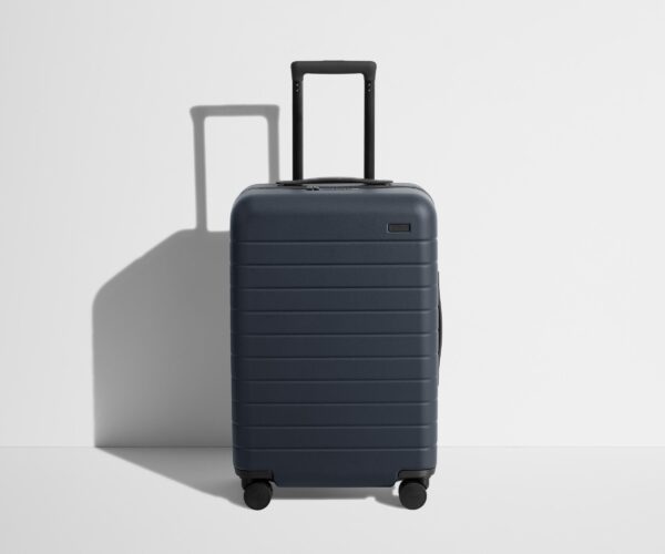 The Bigger Carry-On Flex in Navy Blue